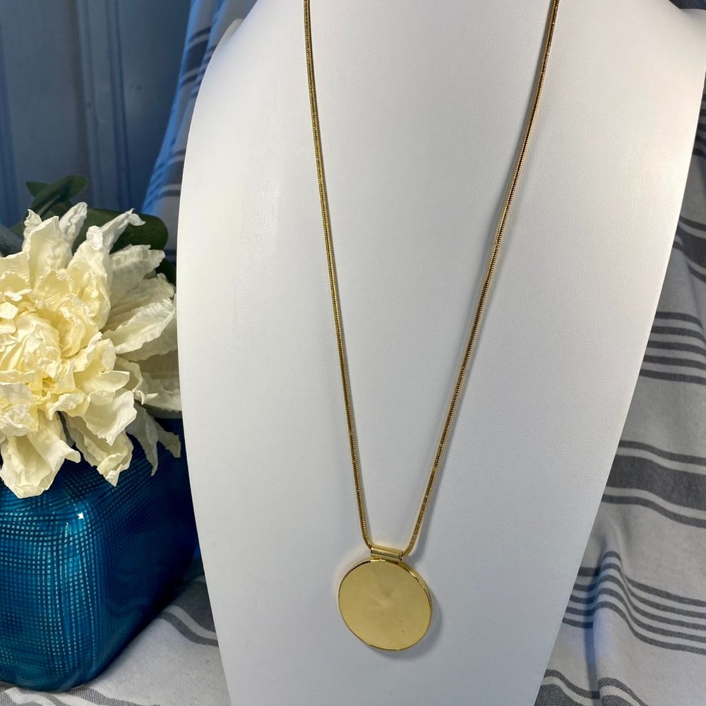 Elegant Gold Tone Necklace with Heavy Round Pendant